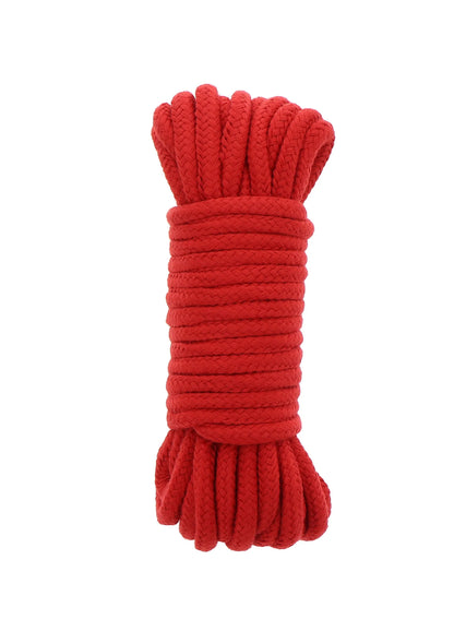Bondagekoord van Hidden Desire, rood opgerold met geknoopte onderlus