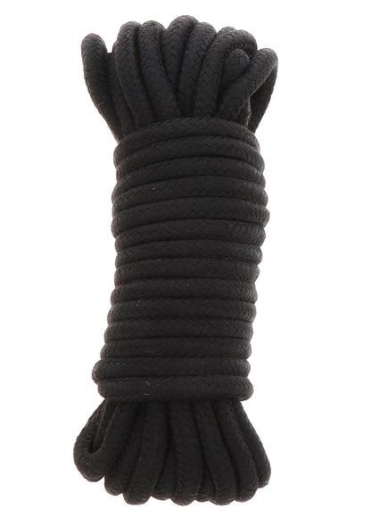 Zwarte bondage-koordbundel met opgerolde strengen en geknoopte uiteinden.