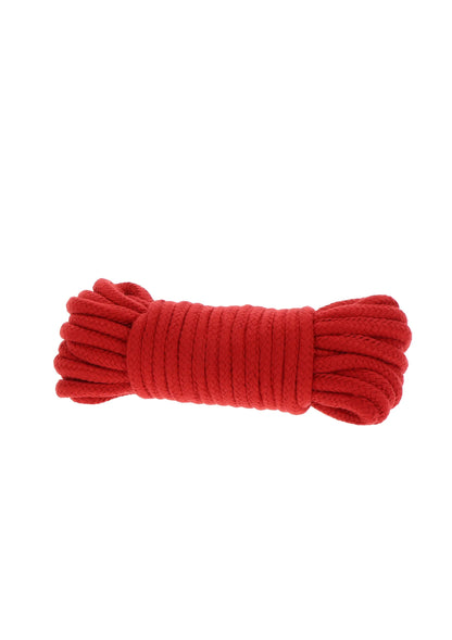 Rood bondage-koord opgerold met geknoopte uiteinden, langwerpige vorm.