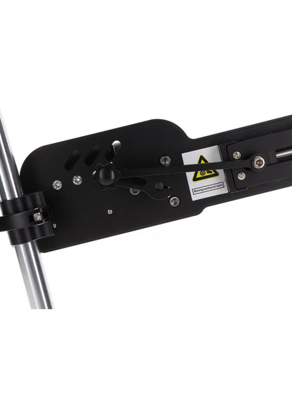 Zwarte basisplaat van seksmachine met aansluitingen en waarschuwingslabel