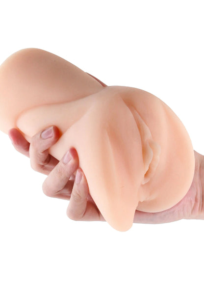 Close-up van fleshkleurig masturbatiespeeltje met open detail en zachte randen