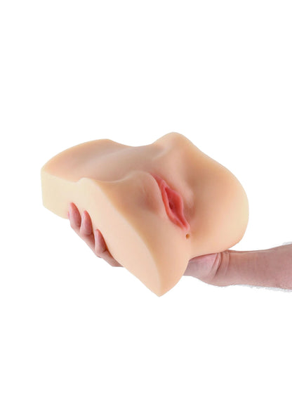 Fleshtone masturbatiehulpmiddel in hand, opening en neerwaartse vorm