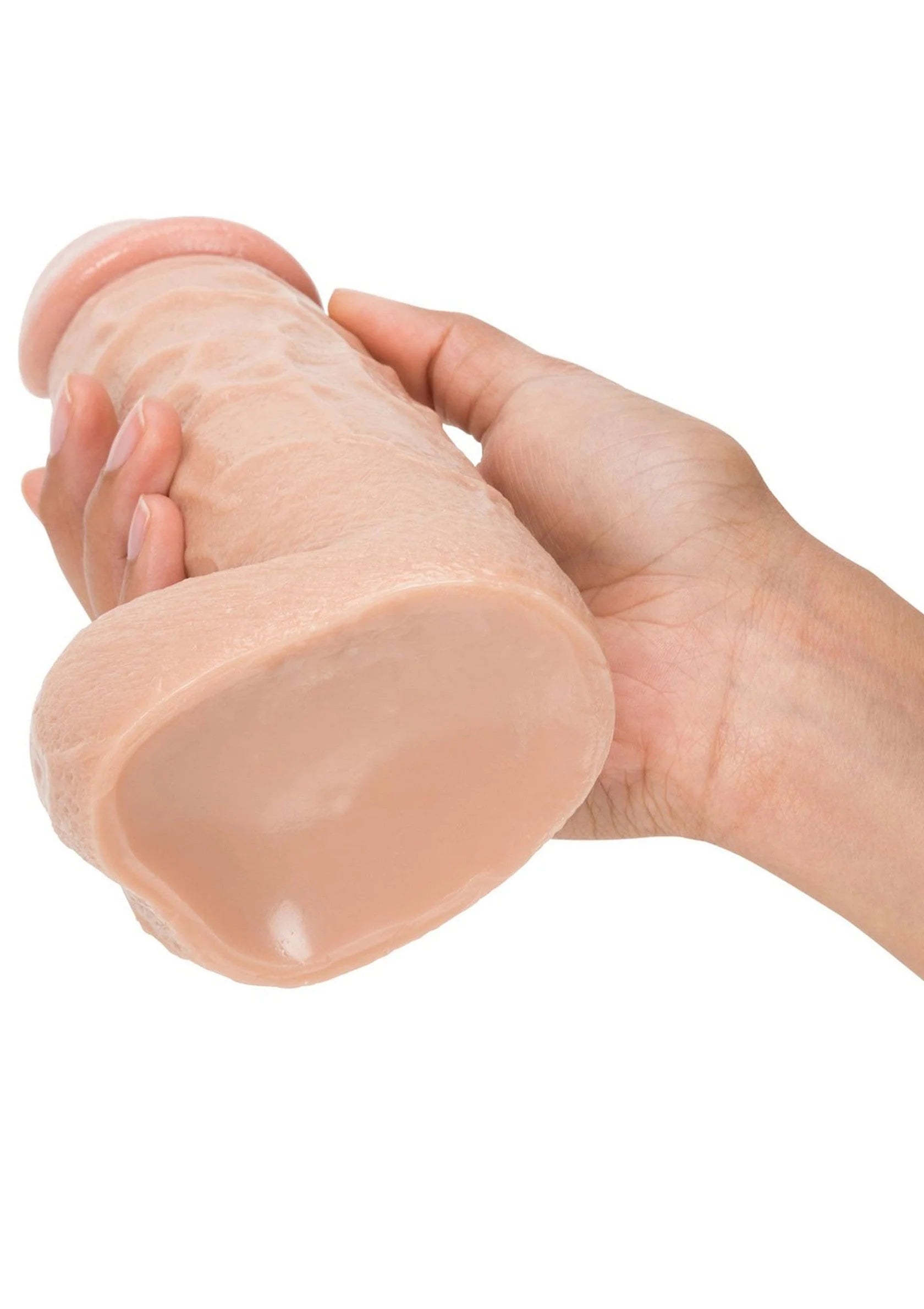 Roze dildo in hand, glanzend oppervlak en afgeronde kop