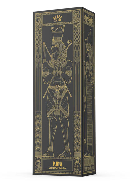 Zwarte vibratorverpakking met gouden koninggrafiek en subtiele ornamenten.