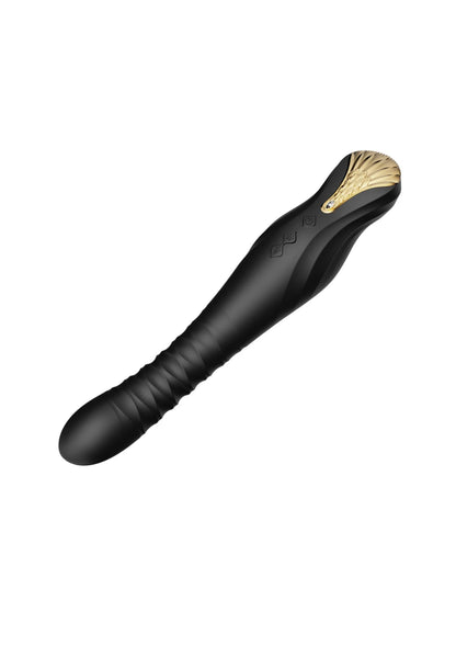 Zwarte dildo met goudkleurige neus, afgeronde vorm en zachte textuur.