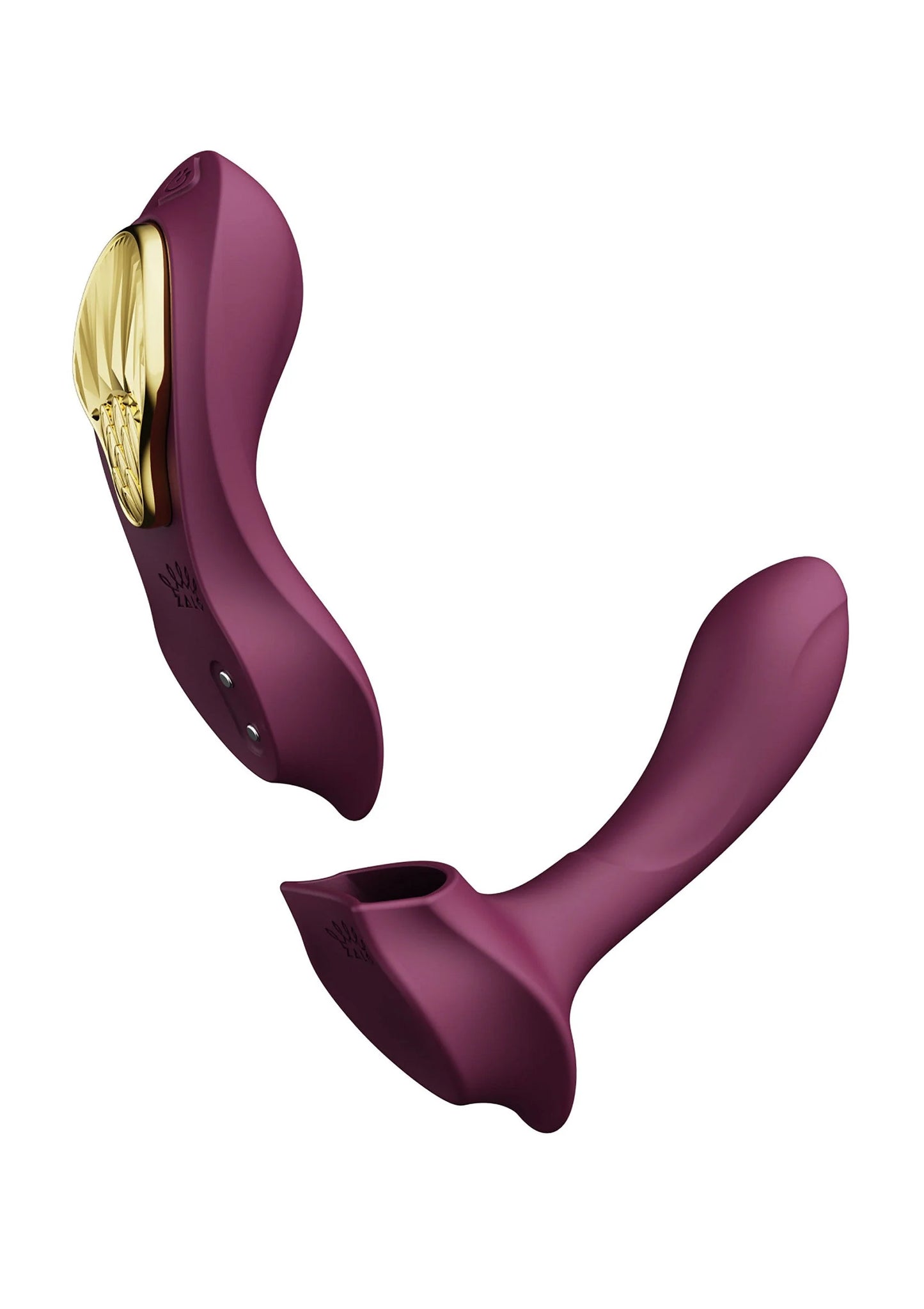 Draagbare vibrator in paars met gouden inzet en ronde bedieningsknop aan de bovenkant.