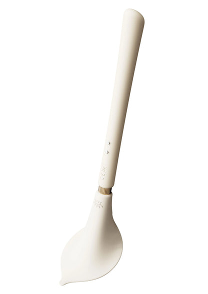 Witte vibrerende stimulator met gladde handgreep en kleine knoppen bij de voet