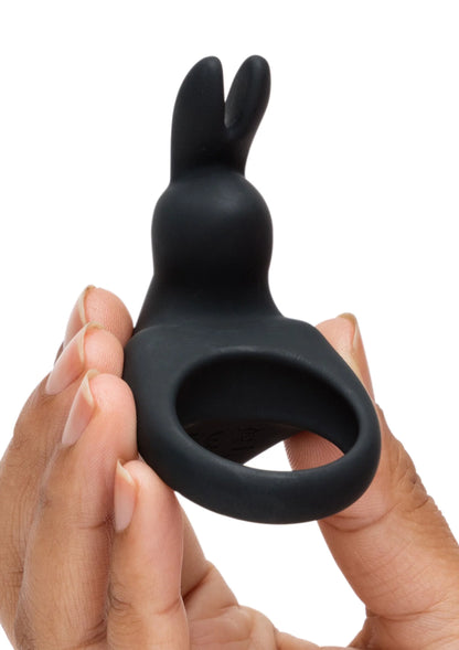 Zwarte kokkerring van Happy Rabbit, in de hand met ronde opening