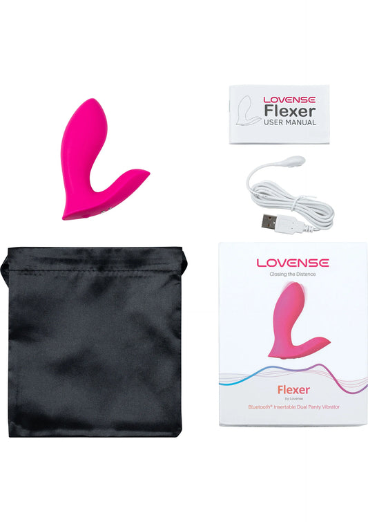 Roze vibrator met opberzak en meegeleverde kabels en handleiding