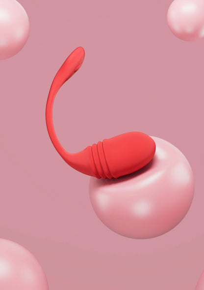 Rode U-vormige G-spot vibrator met geribbelde sectie en ronde kop.