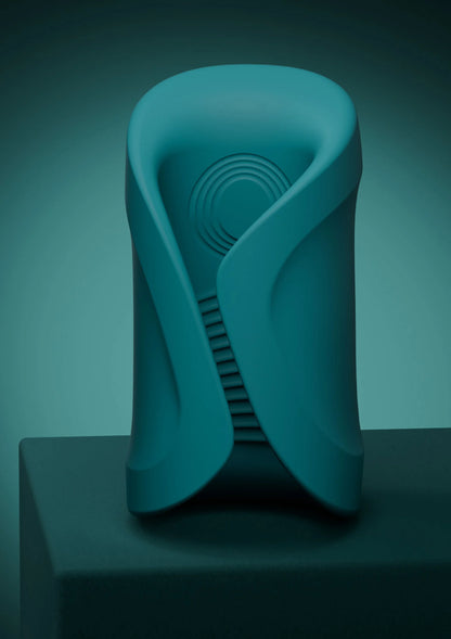 Teal intieme massager met zichtbare massagekop en ribbels