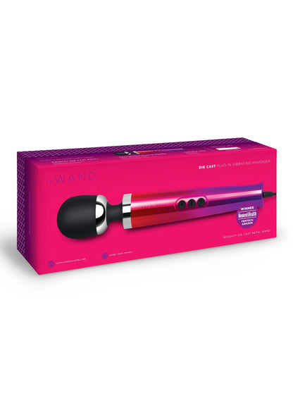 Le Wand vibrerende massager in verpakking met rood-paarse behuizing