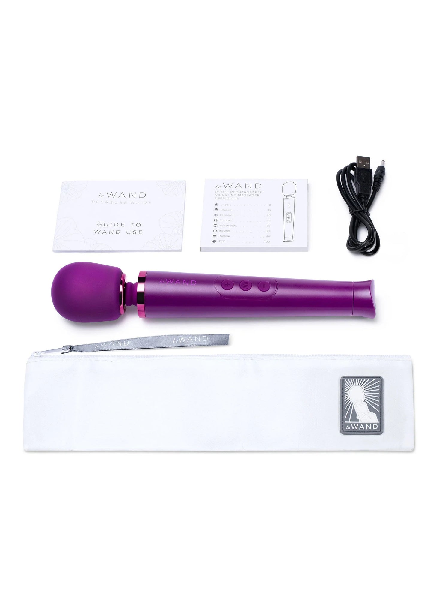 Paarse oplaadbare vibrerende wand met accessoires: hoes, kabel en handleiding