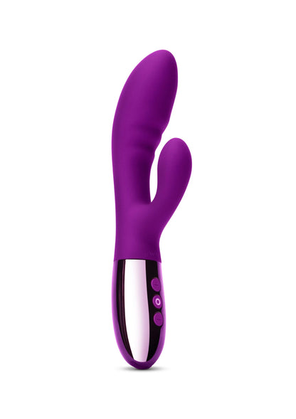 Paarse vibrator met gebogen dubbele vorm en zwarte basis met bedieningsknoppen