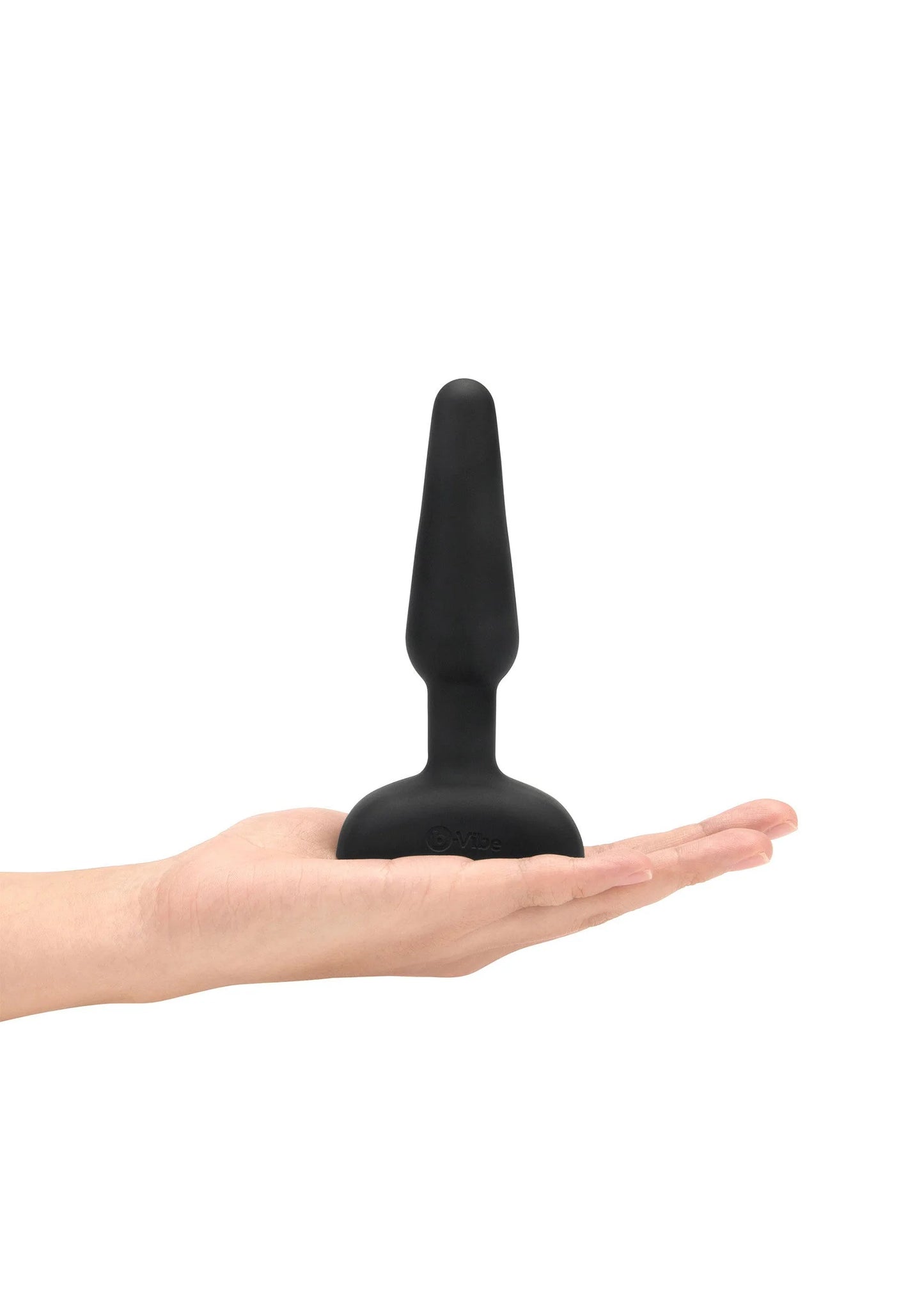 Zwarte anaale plug in hand, conische vorm