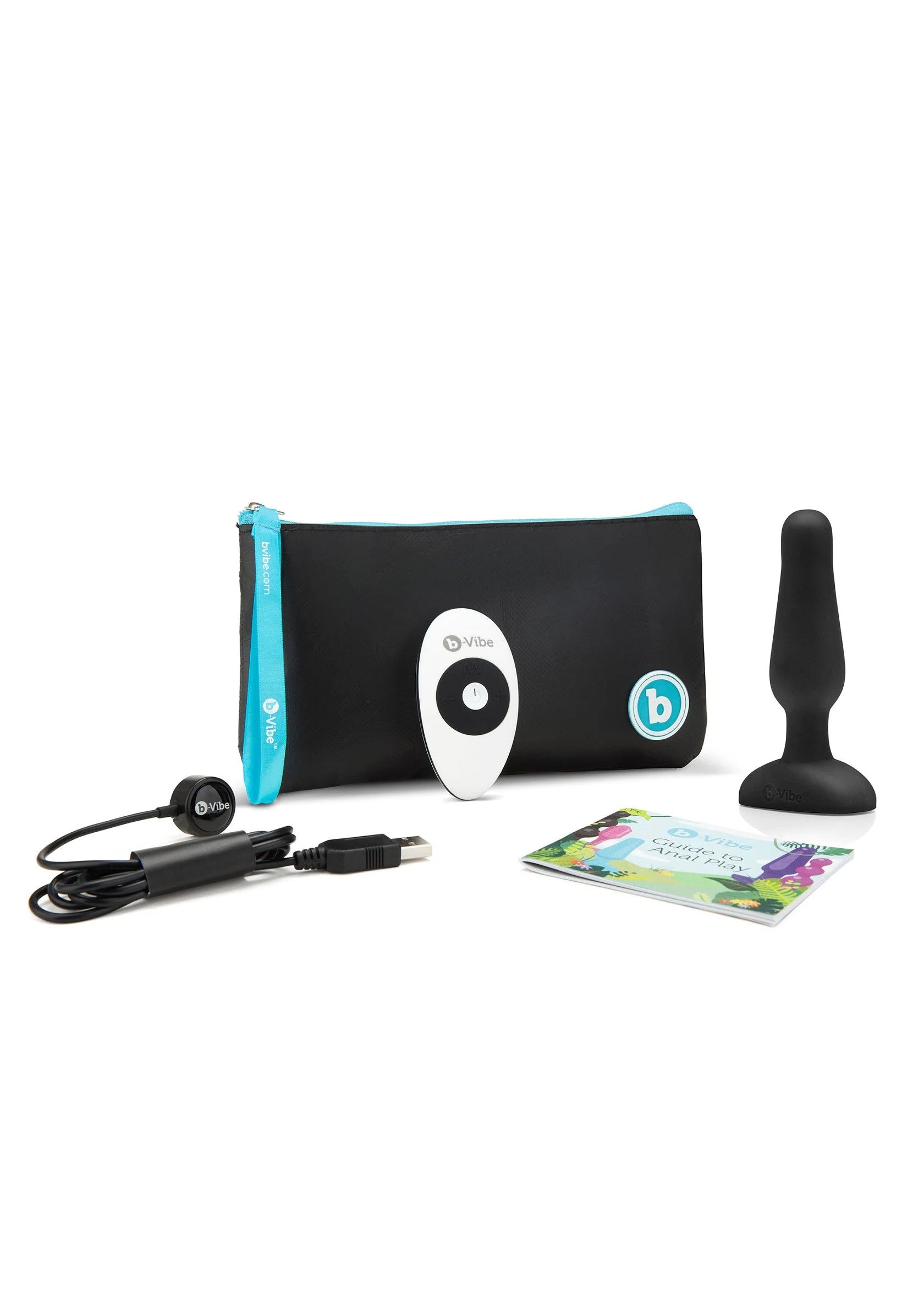 Zwarte anale plug naast opbergtasje, boekje, kabel en controller.