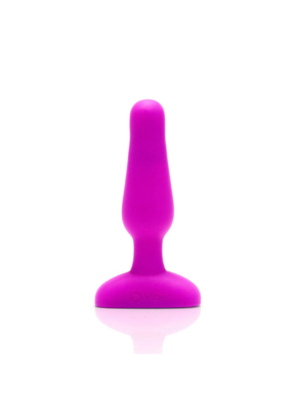 B-Vibe novice plug in fuchsia, staand silhouet met ronde voet