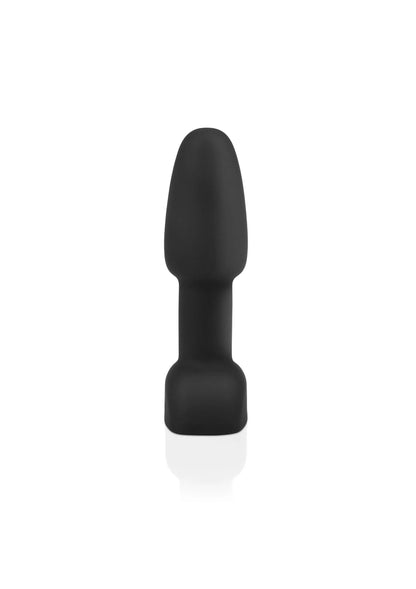 Zwarte compacte rimming-vibrator met taps toelopende plug en brede voet