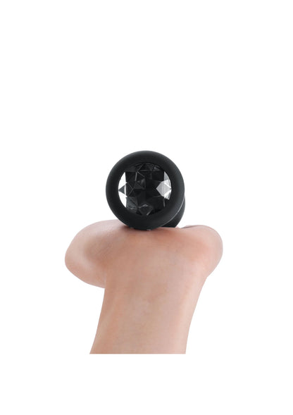 Zwarte anale plug met zichtbare diamant-inzet aan de voorkant