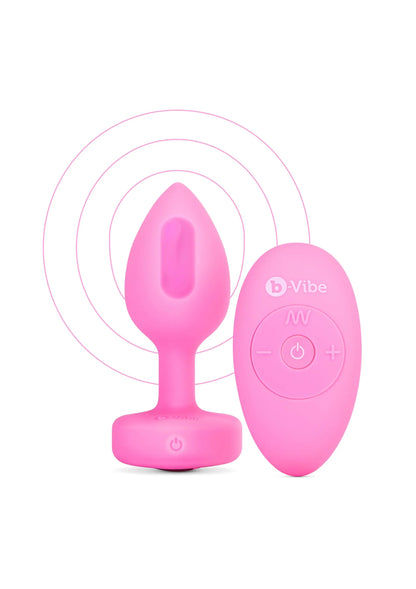 Roze B-Vibe hartvormige anale plug met controller en trilmarkeringen