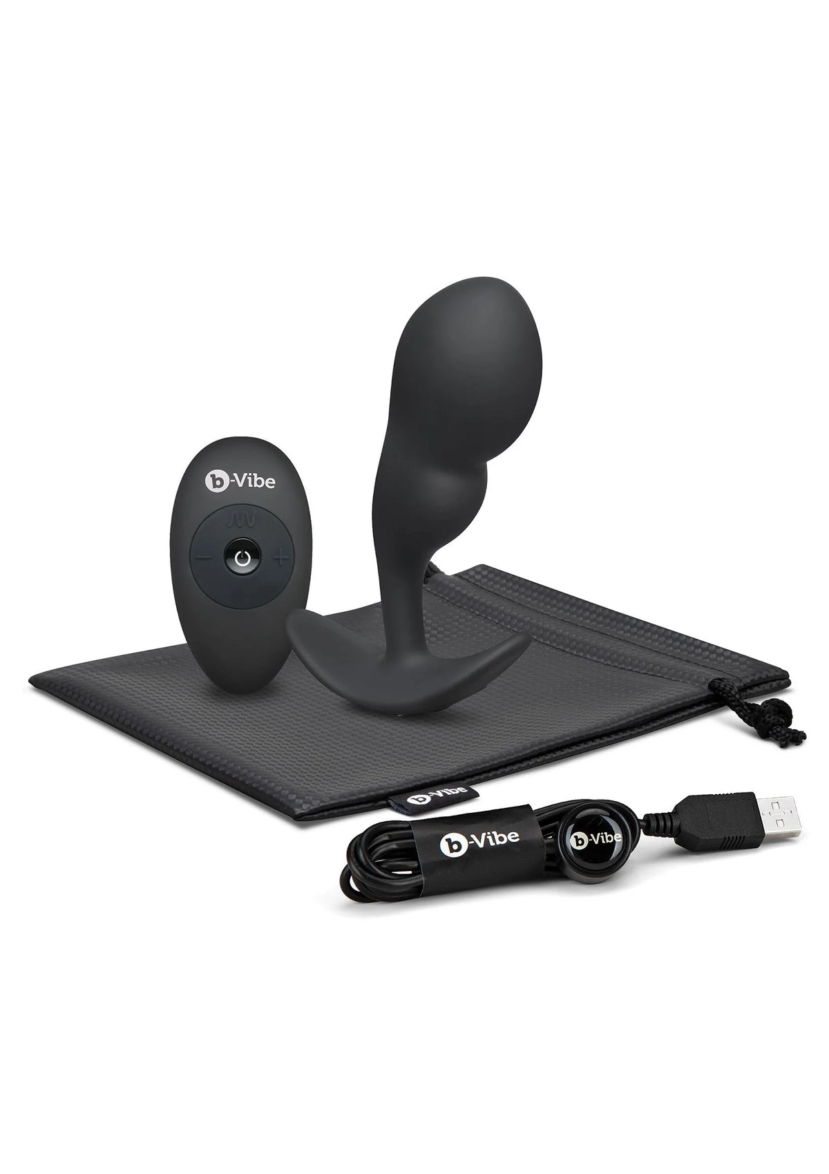 Zwarte P-spot plug met afstandsbediening en USB-kabel op opbergmat