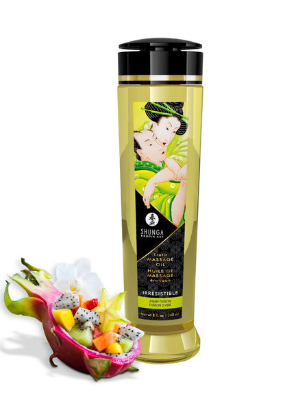 Massageolie-fles Shunga met zwarte dop en groen etiket, met exotisch fruit.