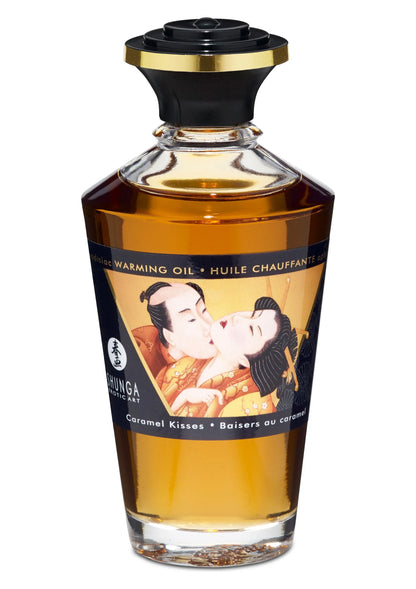 Shunga verwarmingsolie 100 ml fles, Caramel Kisses, amberkleurig, zwarte dop