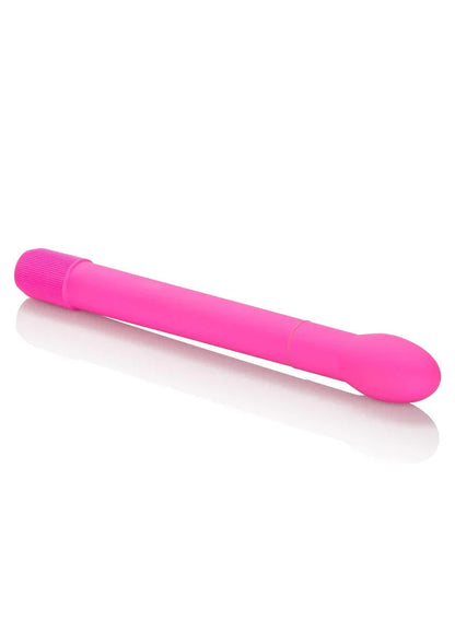 Bright pink slender vibrator with rounded tip and textured base on white background
