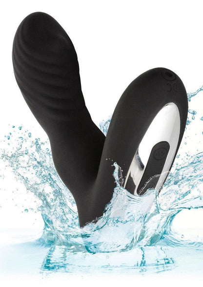 Black dual-stimulation waterproof anal vibrator with textured surface splashing in water