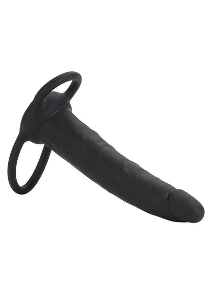 Black silicone double-ended sex toy with two rings on a white background