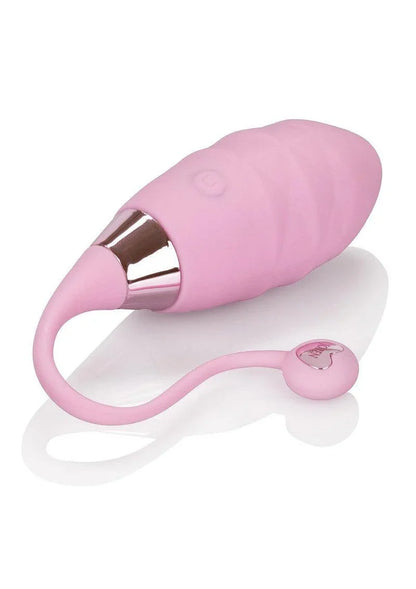 Pink remote-controlled bullet vibrator with smooth, rounded design and metallic accent