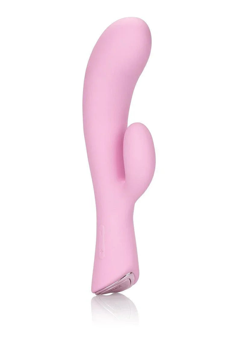 Pink silicone dual G-spot and clitoral vibrator with curved design on white background