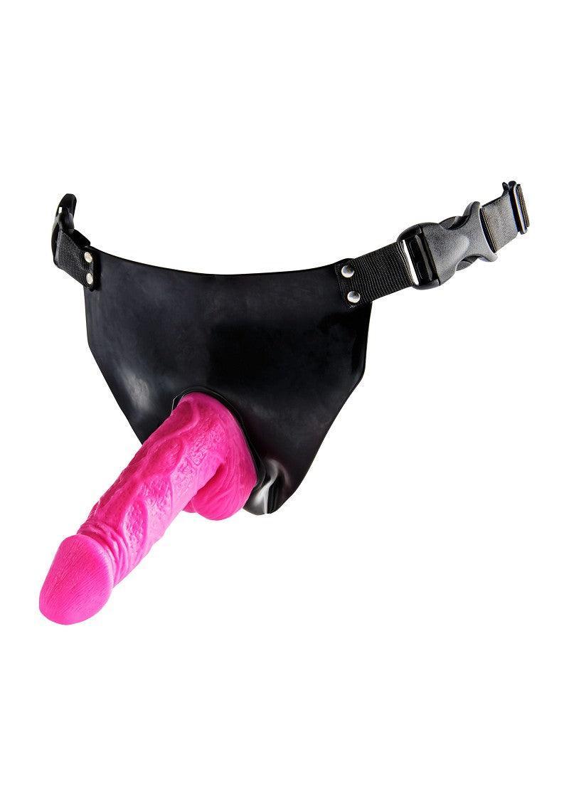 Black strap-on harness with adjustable buckles and bright pink vibrating dildo attachment