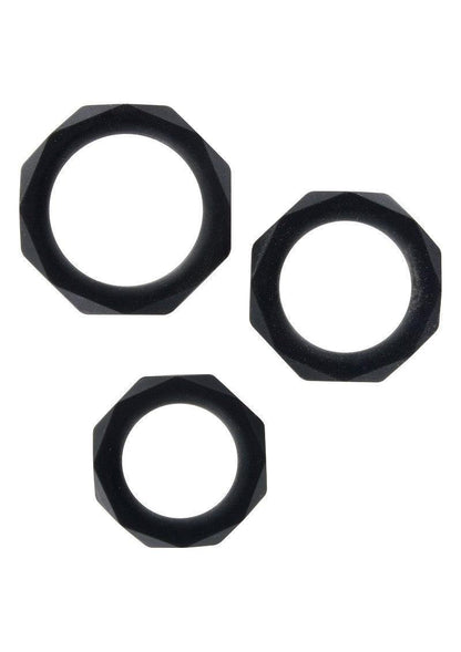 Three black faceted silicone power rings of different sizes on white background